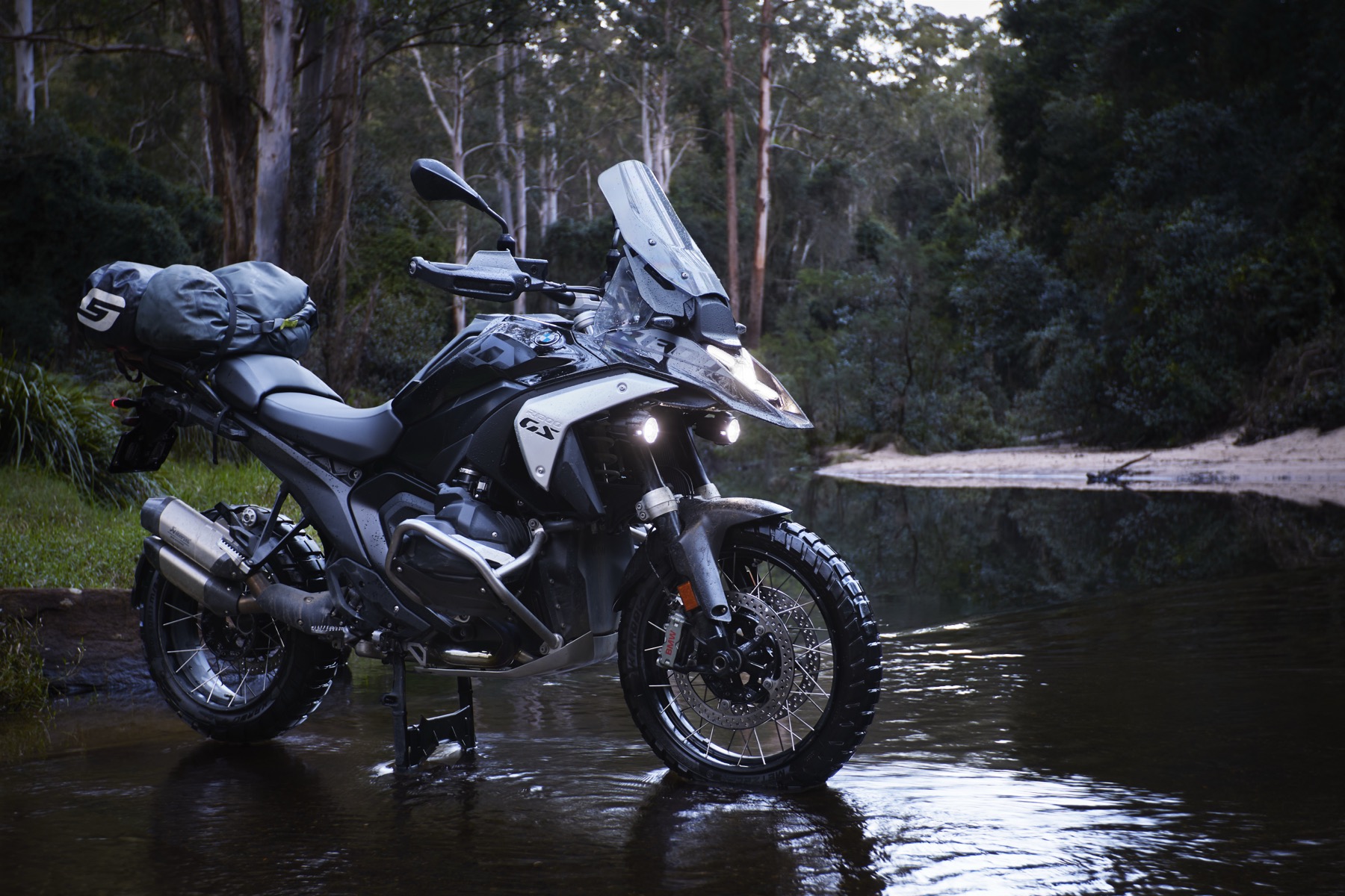 BMW R 1300 GS at water at dusk